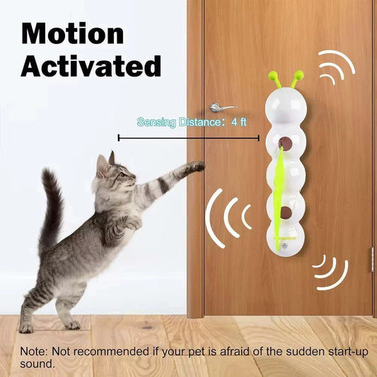 The toy fixed to a door, starting as a cat walks within about 1.2 metres