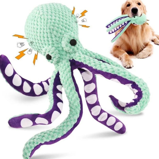 Mint green plush octopus toy with purple legs beside a golden retriever