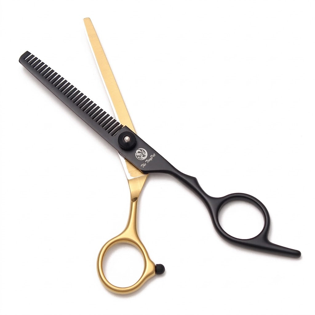 Straight shears with a gold blade and black handle