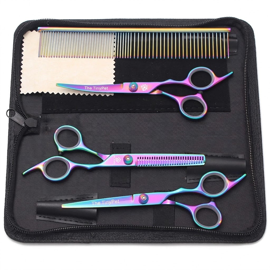 Rainbow finish scissors set laid out in the zip case with a comb