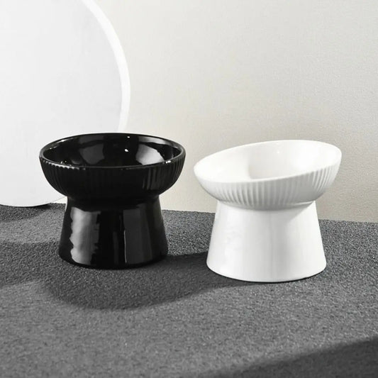 Black and white fluted pedestal bowls side by side