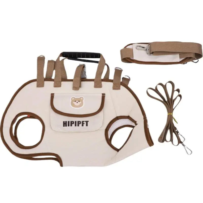 The carrier bag shown flat alongside its detachable shoulder strap and lead