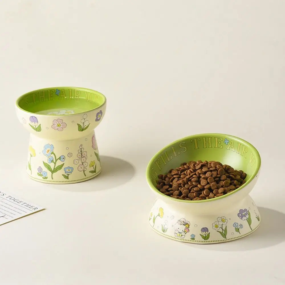 Two floral ceramic bowls of different heights side by side
