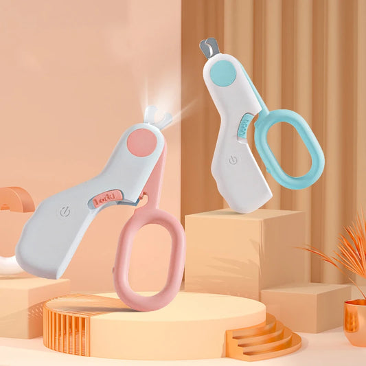 The pink and mint clippers together with the LED switched on