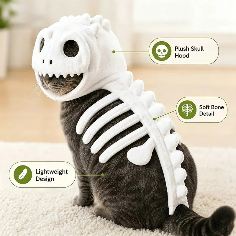 A cat wearing the white round-skull costume with back spikes