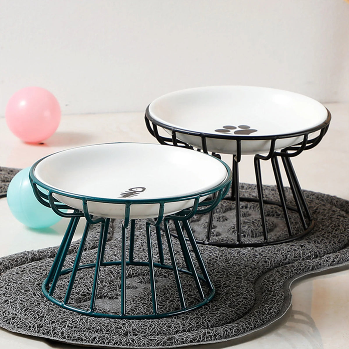 Three stands in black, teal and gold with white dishes