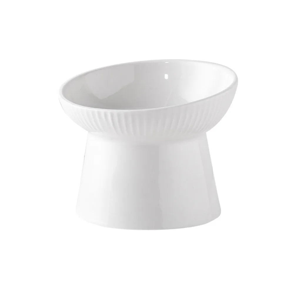 White fluted pedestal bowl seen from the side