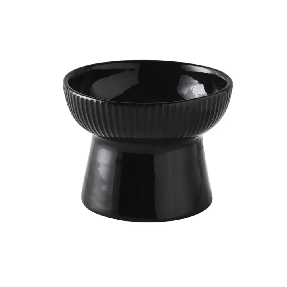 Black fluted pedestal bowl seen from the side