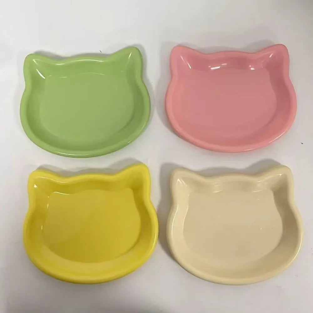 Cream cat-shaped shallow dish seen from above