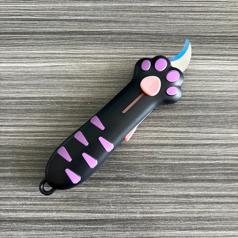 The black and purple cat paw box cutter