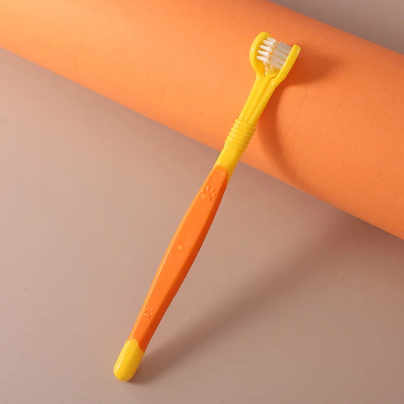 Single yellow and orange toothbrush