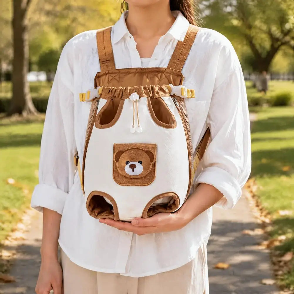 Woman wearing the empty carrier on her chest and holding it from underneath