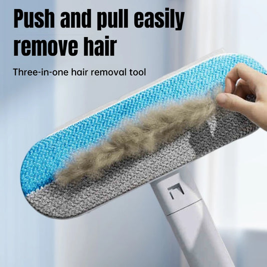 Long-handle pet hair remover lifting hair from a fabric surface