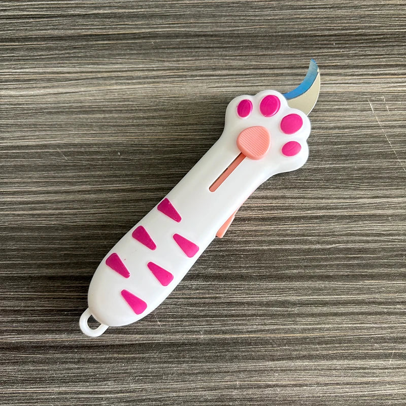 The white and pink cat paw box cutter
