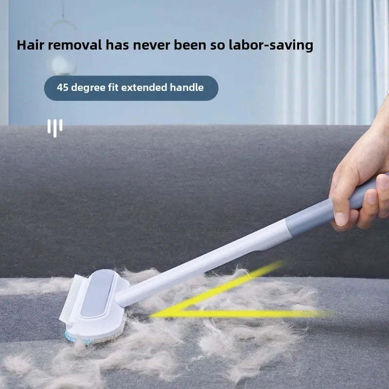The remover being used on a carpet with the handle extended