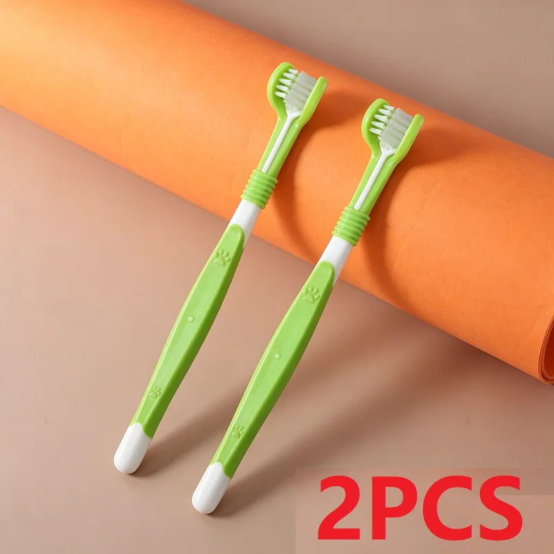 Two green toothbrushes