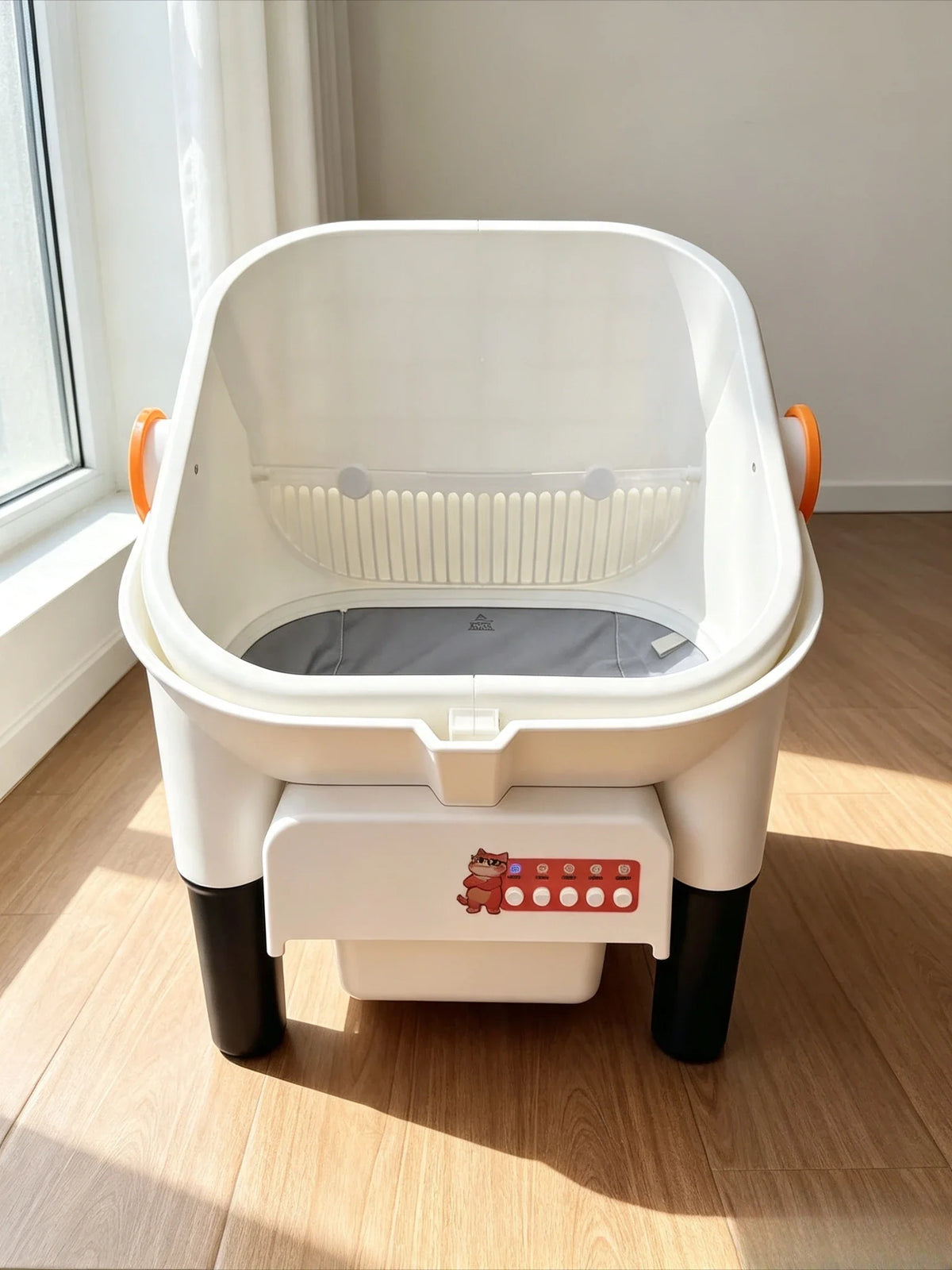 Front view of the open-top litter box, showing the sifting drum and waste drawer